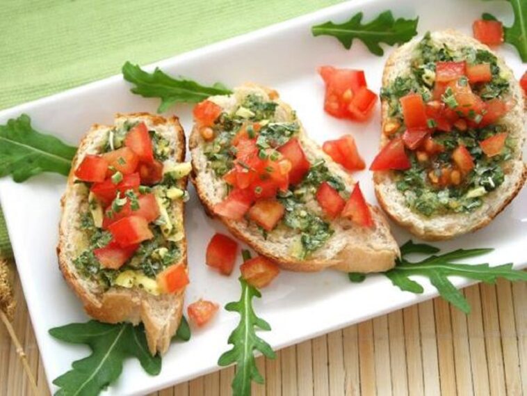 pesto with tomatoes on bread