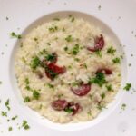 risotto con pasta de salami